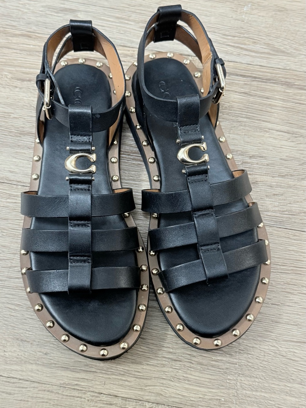 Coach Black Leather Stud-Trim Gladiator Sandals with Gold Logo
